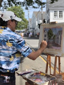 E. J. painting on Main Street