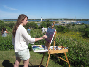 Kate painting at the Edgartown Lighthouse